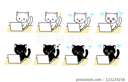 White and black cats working on a PC 123229256