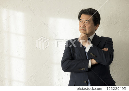 Thinking middle-aged man Thinking middle-aged man 123229495