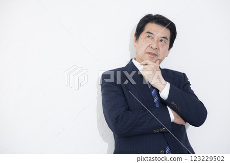 Thinking middle-aged man 123229502