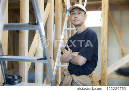 man working at construction site man working at construction site 123229763