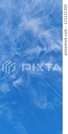 Vertical blue sky photography with white clouds Vertical blue sky photography with white clouds 123231300