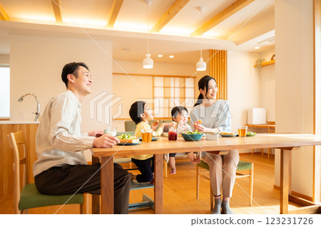 Family of four having breakfast Family of four having breakfast 123231726