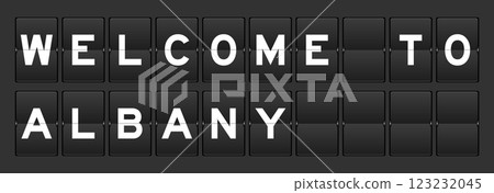 Black color analog flip board with word welcome to albany on gray background 123232045