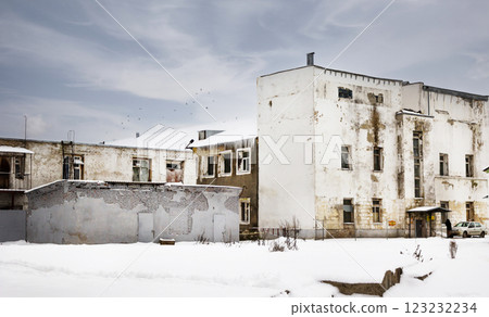 An Abandoned Building in a Winter Landscape, evoking a sense of mystery and decay 123232234
