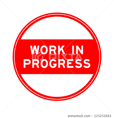 Red color round seal sticker in word work in progress on white background 123232683