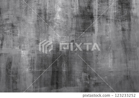 Abstract gray textured background with brush strokes and artistic elements 123233252
