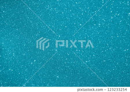 Turquoise glittery texture creating a sparkling and vibrant decorative background 123233254