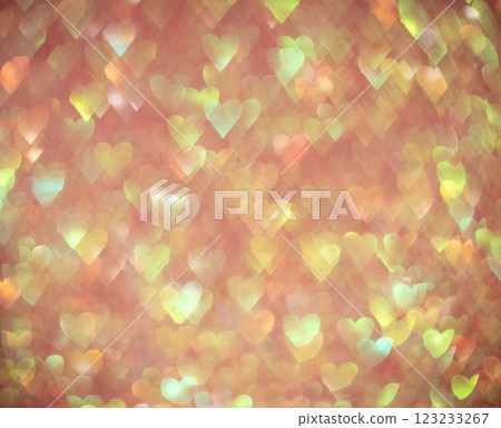 Colorful heart-shaped bokeh lights on a soft pink background 123233267