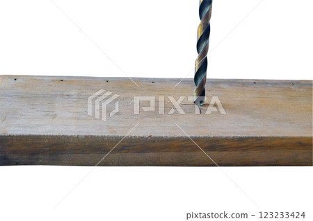 Metal Drill bit on wood board during operation. 123233424