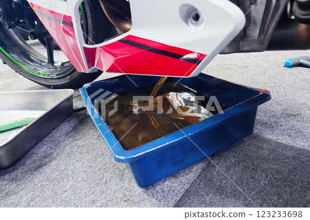 Change oil of motorcycle Change oil of motorcycle 123233698