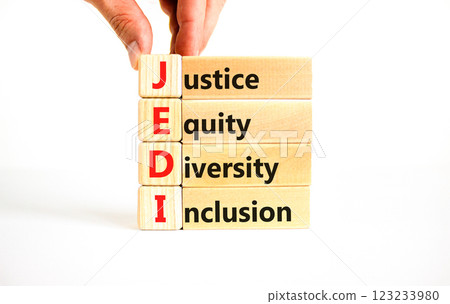 Justice equity diversity inclusion symbol. Concept words JEDI Justice Equity Diversity Inclusion on blocks. Beautiful white background. Business justice equity diversity inclusion concept. Copy space Justice equity diversity inclusion symbol. Concept words JEDI Justice Equity Diversity Inclusion on blocks. Beautiful white background. Business justice equity diversity inclusion concept. Copy space 123233980