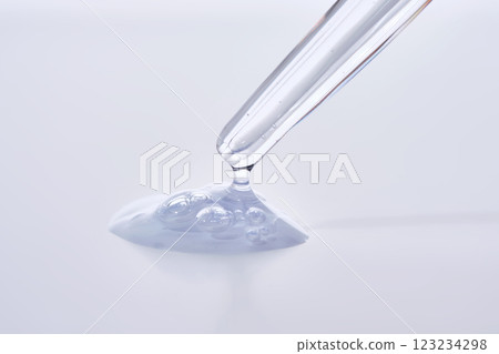 Pipette with delicate blue serum close-up. Pipette with delicate blue serum close-up. 123234298