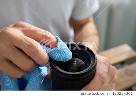 Successfully Cleaning Your Camera Lens with a High-quality Microfiber Cloth to Ensure Clarity 123234361