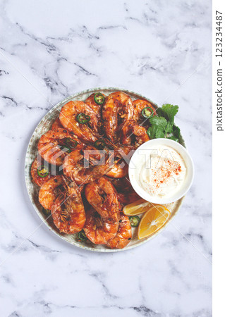 Grilled shrimps served with hot sauce and slices of fresh lemon, homemade, no people, 123234487