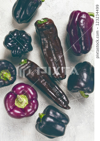 Assortment of purple and black pepper , scattered on the table, top view, no people, 123234499