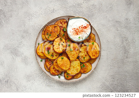 Crispy potato slices, with parmesan cheese and spices, fried in the oven, homemade, no people, Crispy potato slices, with parmesan cheese and spices, fried in the oven, homemade, no people, 123234527