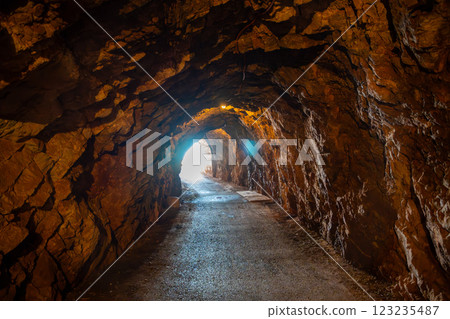 Pedestrian tunnel through a rock or mountain near Petrovac town in winter time, Montenegro Pedestrian tunnel through a rock or mountain near Petrovac town in winter time, Montenegro 123235487