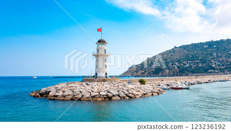Panoramic view of old lighthouse in Alanya port. Landscape view of Mediterranean coast, Alanya, Turkey. High quality photo Panoramic view of old lighthouse in Alanya port. Landscape view of Mediterranean coast, Alanya, Turkey. High quality photo 123236192