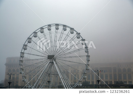 Ferris wheel in front of Palace of Parliament. Bucharest, Romania. Ferris wheel in front of Palace of Parliament. Bucharest, Romania. 123236261