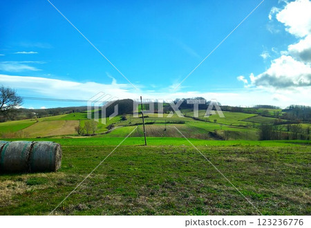 Field in a mountain village in early spring Field in a mountain village in early spring 123236776