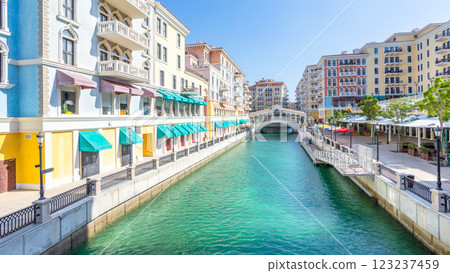 Qanat Quartier Venetian copy luxury residential district with authentic colorful apartment buildings and water channel with bridge, Pearl Island, Doha, Qatar Qanat Quartier Venetian copy luxury residential district with authentic colorful apartment buildings and water channel with bridge, Pearl Island, Doha, Qatar 123237459
