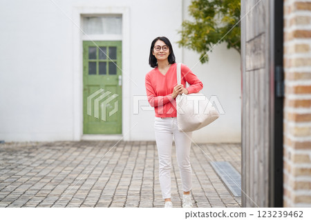 Woman going out Woman going out 123239462