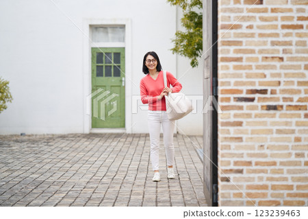 Woman going out Woman going out 123239463