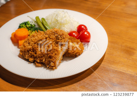 Crispy pork cutlet and colorful vegetable platter Crispy pork cutlet and colorful vegetable platter 123239877