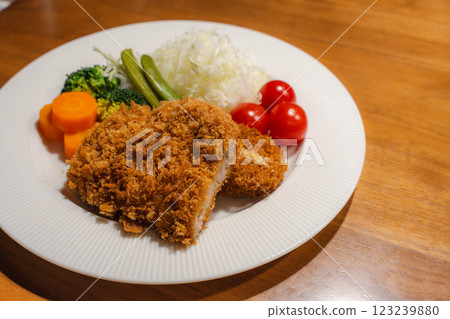 Crispy pork cutlet and colorful vegetable platter 123239880