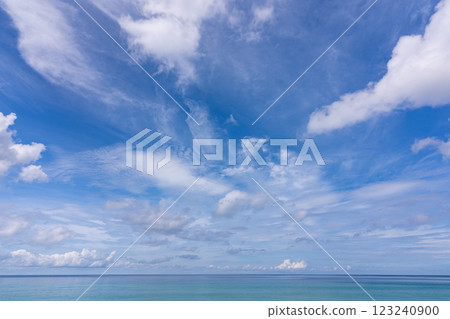 Beautiful blue sky white clouds over sea ocean background Beautiful blue sky white clouds over sea ocean background 123240900