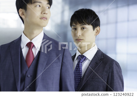 A new employee feeling down behind his senior A new employee feeling down behind his senior 123240922