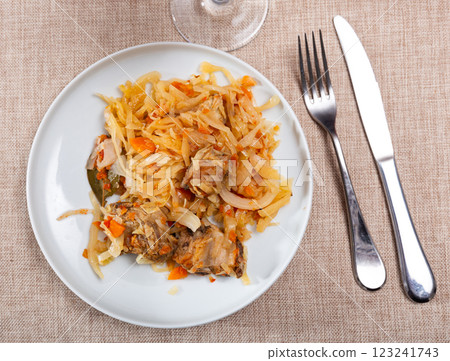 Stewed pork ribs served with cabbage 123241743