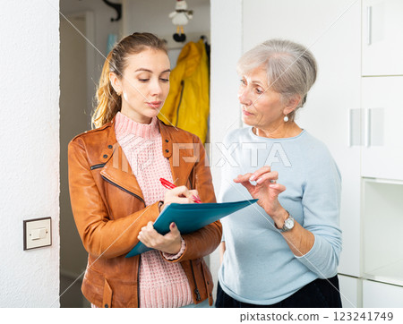 Senior woman participating in social inquiry at home Senior woman participating in social inquiry at home 123241749