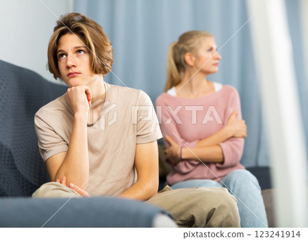 Portrait of unhappy son after discord with mother 123241914
