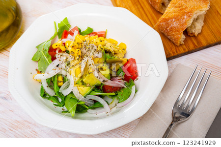 Salad with fresh tomatoes, avocado Salad with fresh tomatoes, avocado 123241929