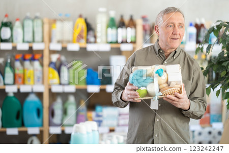 Elderly man choosing a bath gift set Elderly man choosing a bath gift set 123242247