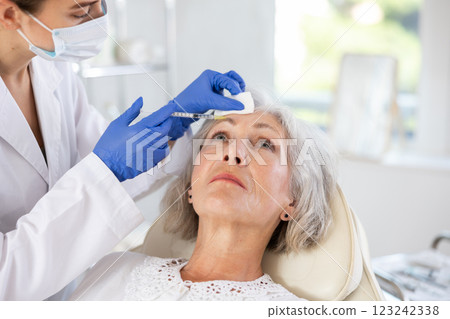 Facial injection mature patient Facial injection mature patient 123242338