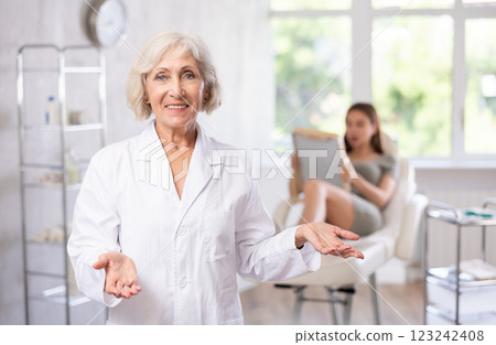Elderly female doctor portrait Elderly female doctor portrait 123242408
