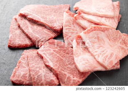 Raw Japanese black beef, grade 5, top stripes and chestnuts Raw Japanese black beef, grade 5, top stripes and chestnuts 123242605