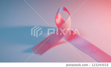 Soft pink ribbon against a minimalist backdrop highlighting the essence of Breast Cancer Awareness Month. Awareness concept 123243018