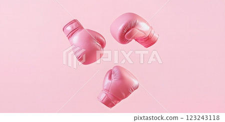 Floating pink boxing gloves in a minimalist style with a solid backdrop for a sleek sports vibe. Sports concept 123243118