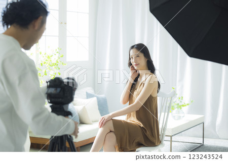 Photographer, model, hair and makeup photoshoot 123243524