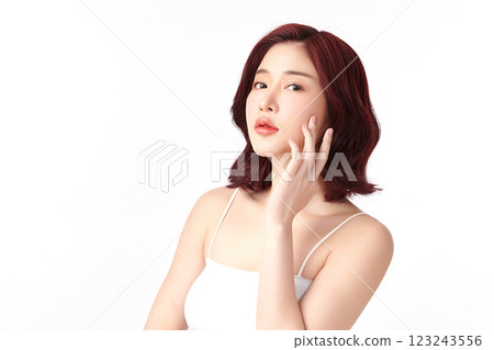 Beautiful young asian woman with clean fresh skin on white background, Face care, Facial treatment, Cosmetology, beauty and spa, Asian women portrait. Beautiful young asian woman with clean fresh skin on white background, Face care, Facial treatment, Cosmetology, beauty and spa, Asian women portrait. 123243556