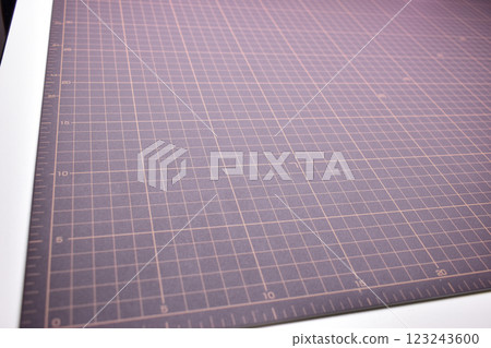 black cutting mat board background with line and scale measure guide pattern for object art design black cutting mat board background with line and scale measure guide pattern for object art design 123243600