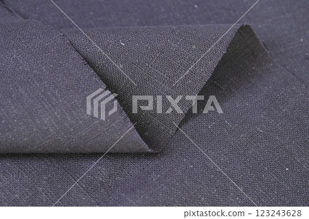 dark beige hemp viscose natural fabric cloth color; sackcloth rough texture of textile fashion 123243628
