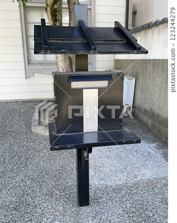 Posts installed on the road 123244279