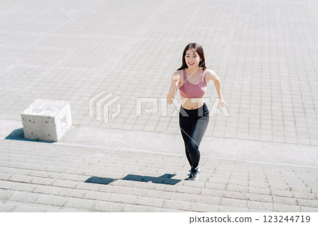 Young woman doing training using stairs 123244719