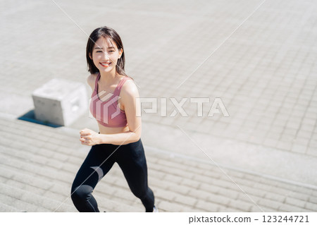 Young woman doing training using stairs 123244721