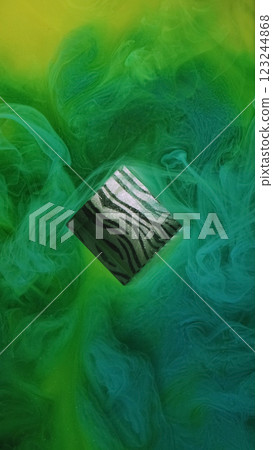 Paint explosion. Shiny vapor. Defocused blue green yellow multicolor haze fume cube mist splash ink texture on abstract art background. 123244868