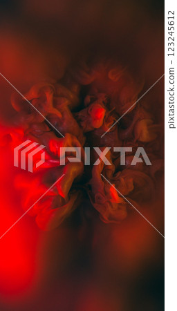 Mystical paint. Glitter spreading. Red orange brown glossy powder emerge wave on dark water surface. Fume shiny fluid mix abstract background. Mystical paint. Glitter spreading. Red orange brown glossy powder emerge wave on dark water surface. Fume shiny fluid mix abstract background. 123245612